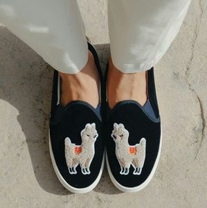 Navy velvet slip on sneakers with llama detail